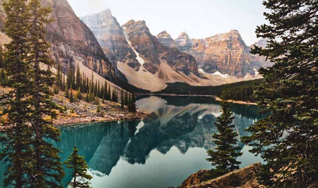 lake moraine vista with mountains and lake