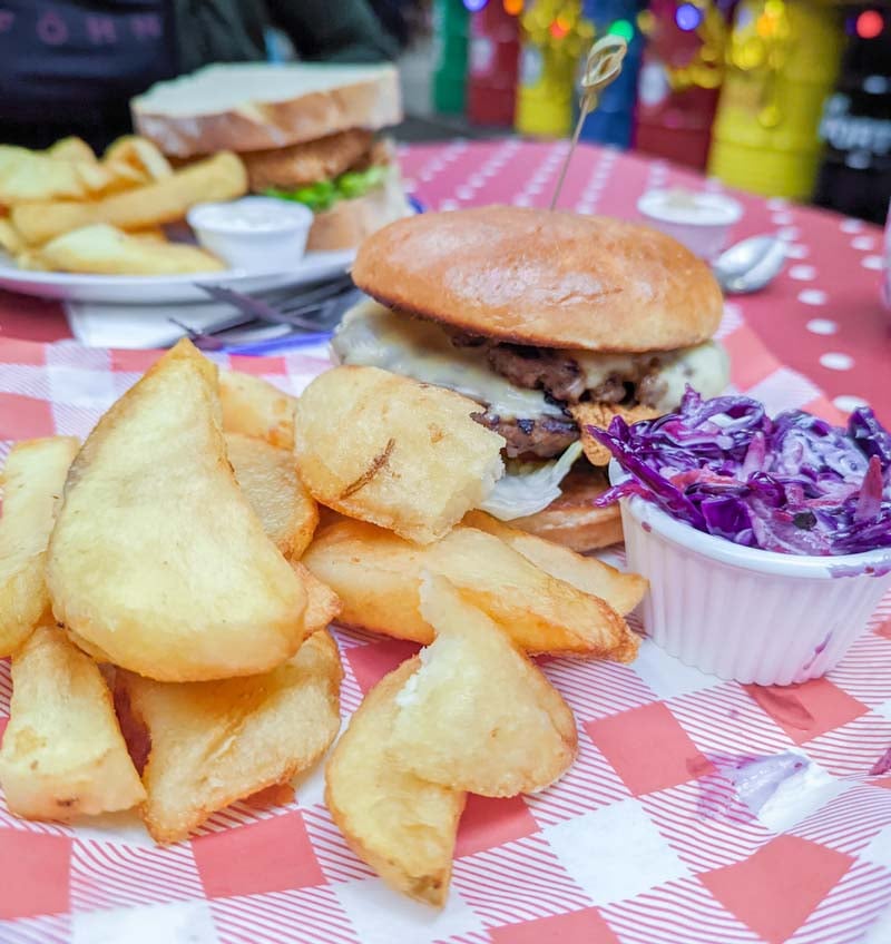 burger and chips at the oil can cafe