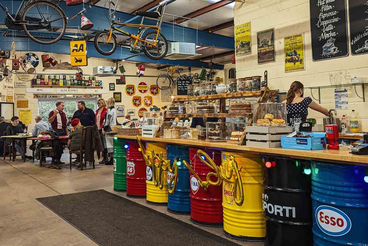 oil can cafe with hanging bikes on the ceiling