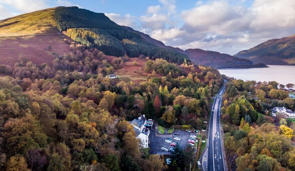 The Inn at Loch Lomond from above with the road to the highlands