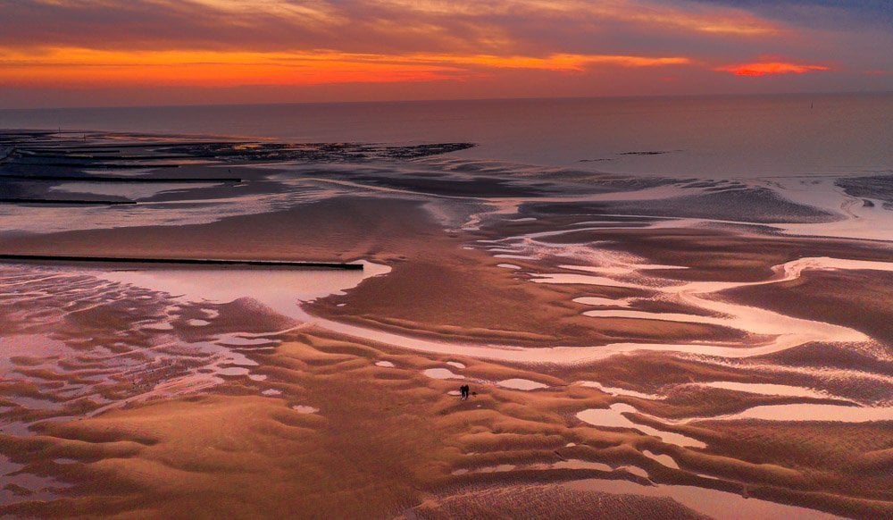 sunset over the sands of rossall point lancashire