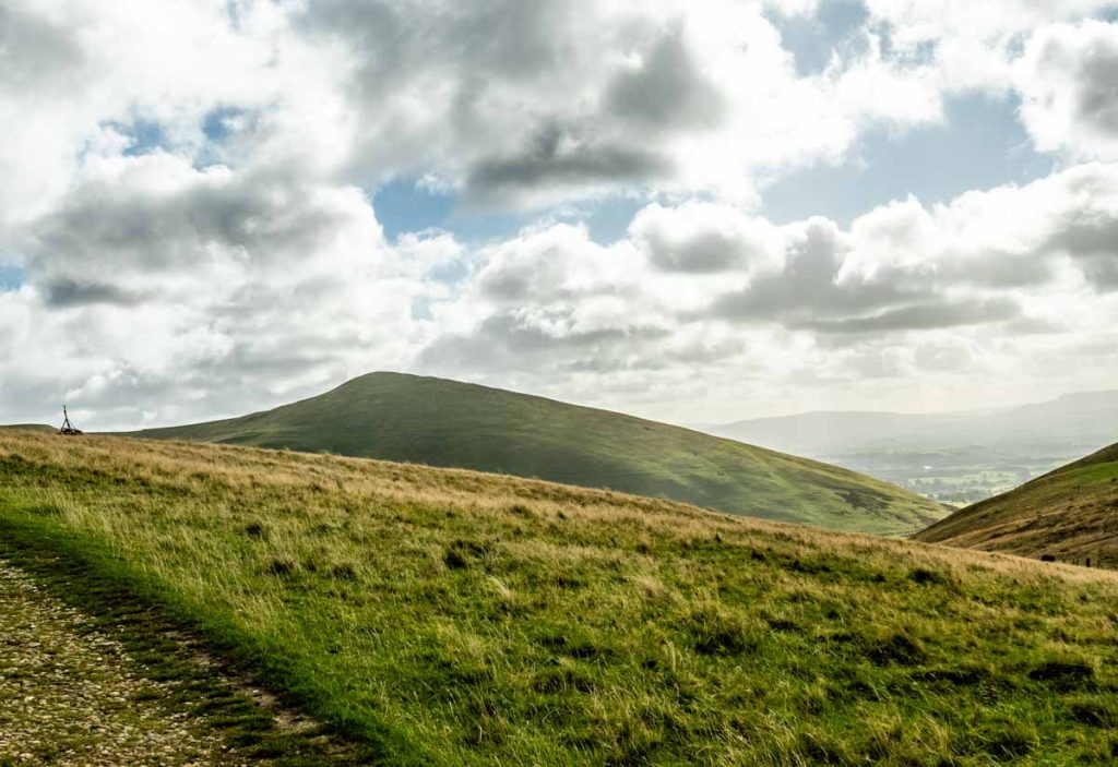 white clouds over a landscape