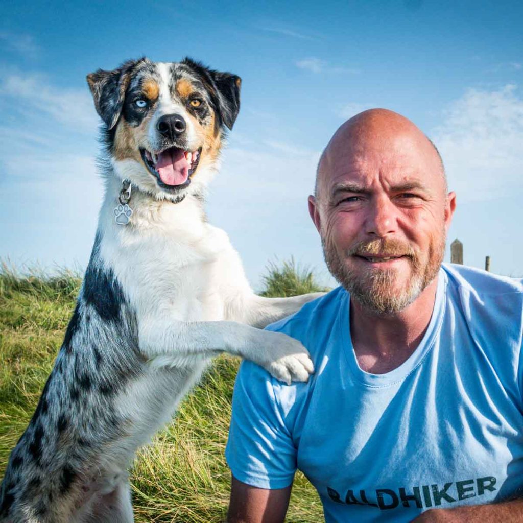 paul steele the baldhiker lead hikig guide with his posing dog, Malc