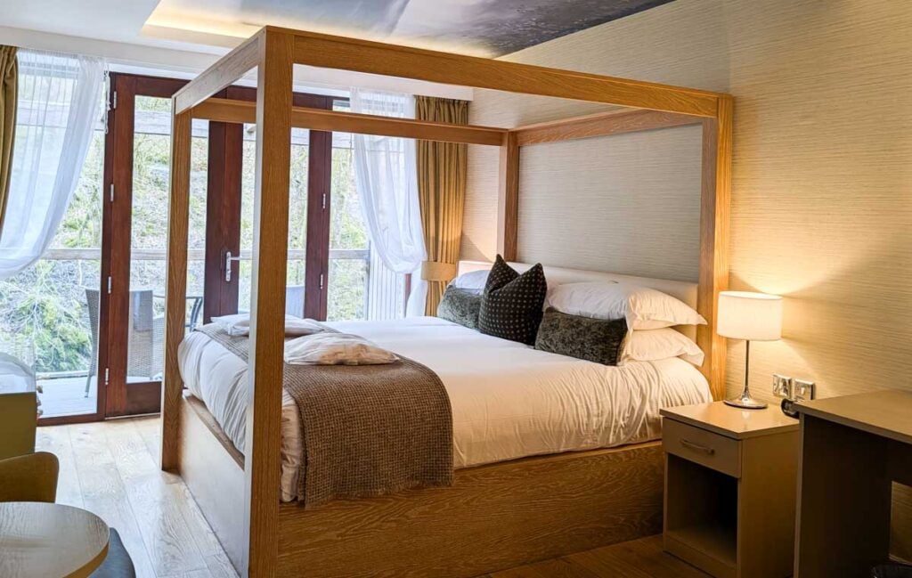 modern 4 poster bed at the langdale hotel
