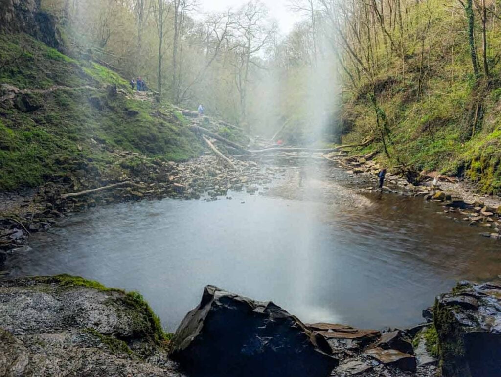 view from behind Henrhyd Falls