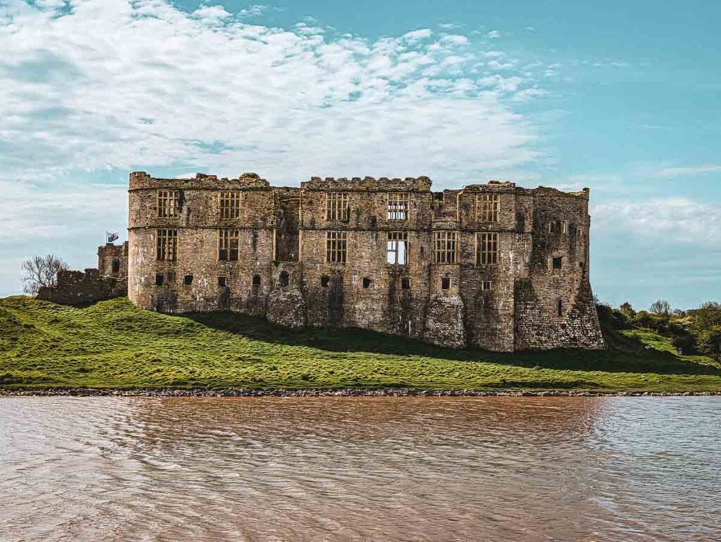carew castle from across the water on the millpond walk