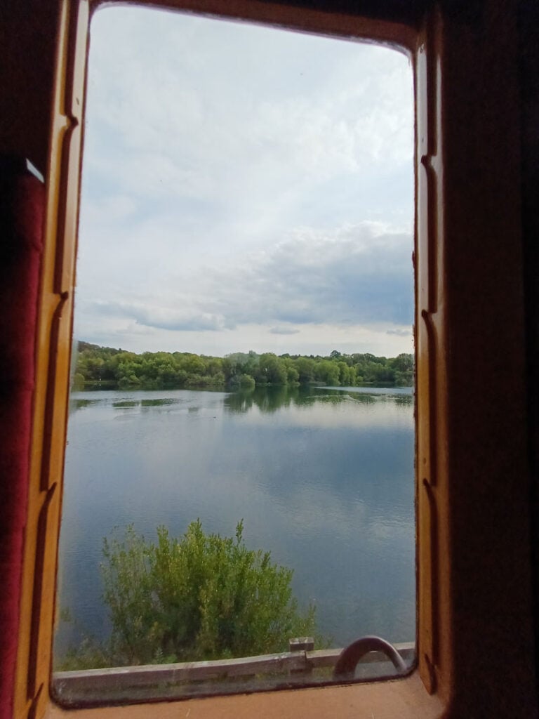 looking out the train at butterley reservoir