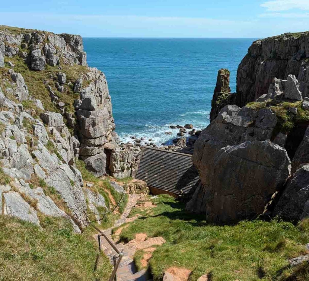 the steps down to St Govan's chapel on the welsh coast
