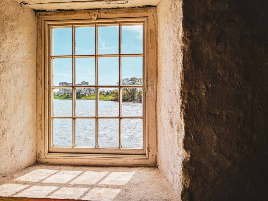 view of castle through the window of the tidal mill