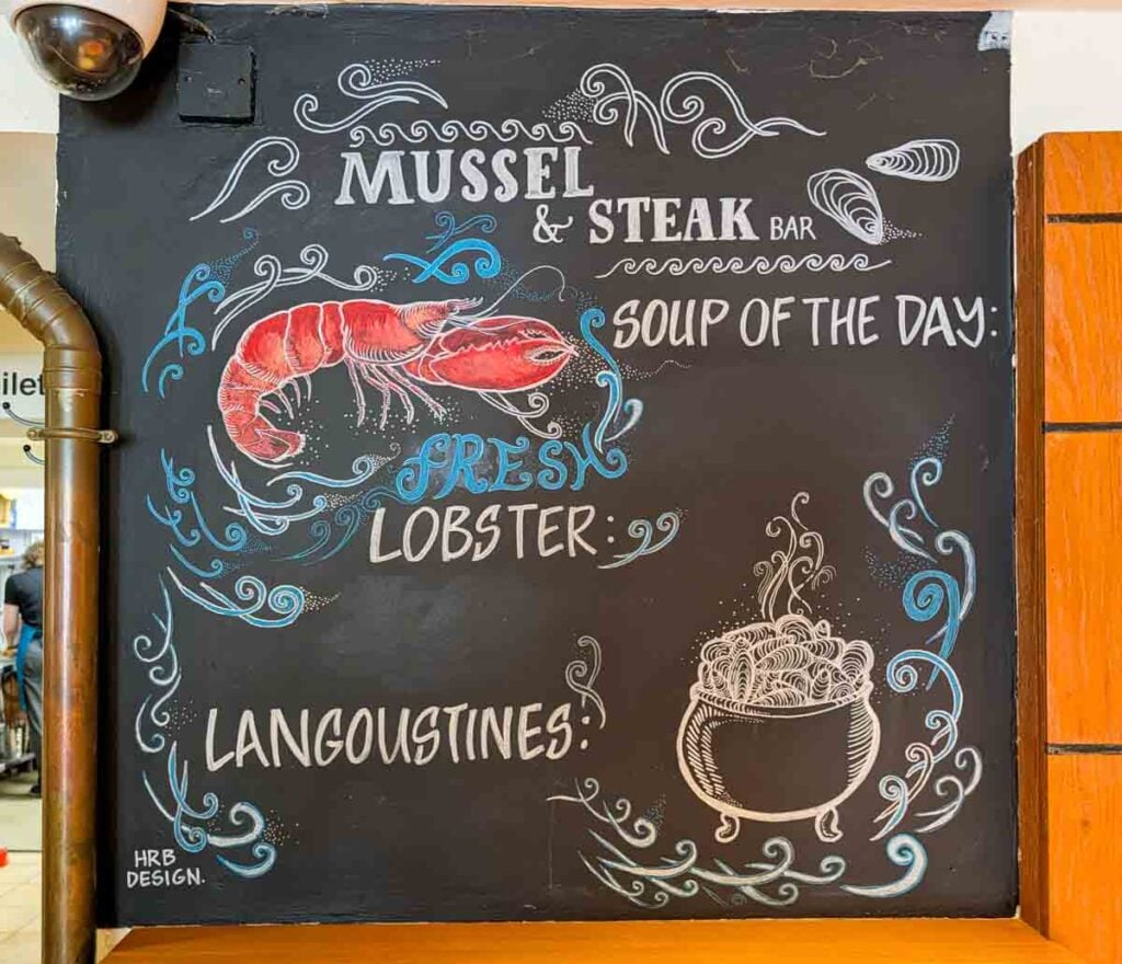 signage in the mussel and steak