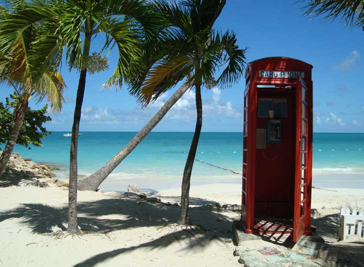 coconut bay Antigua with red phone box