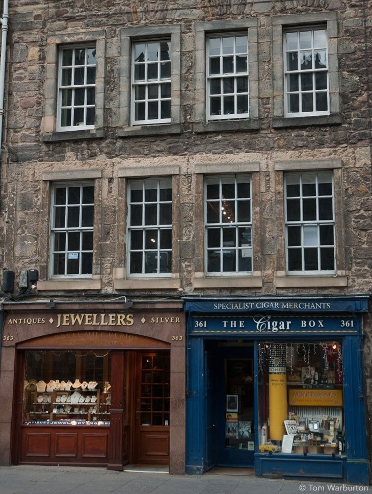 A tobacconist and a jewellers standing side by side