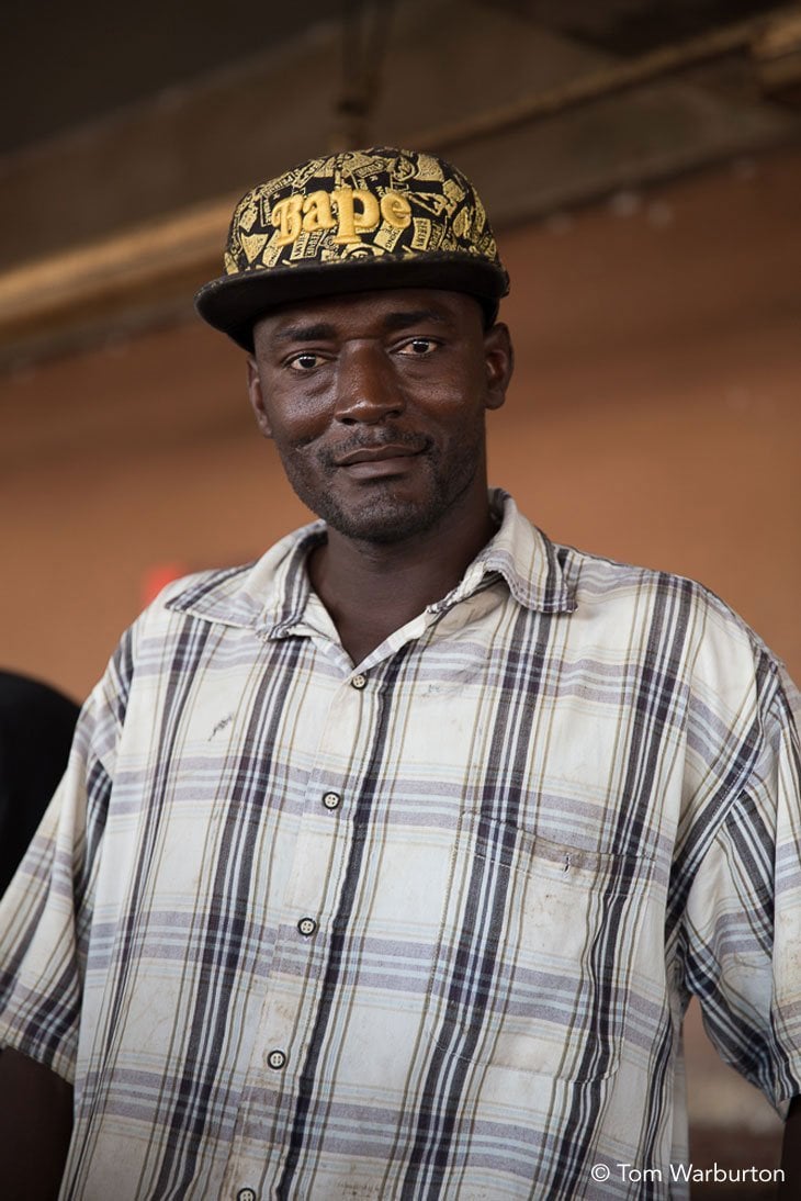 Gambian in baseball cap