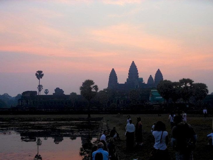 a filigreed shadow of temples against the rising sun