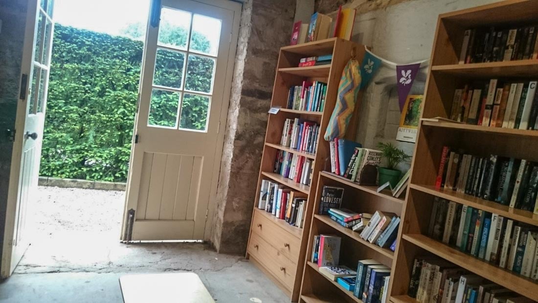 a lbookshop with a bookcase and a door