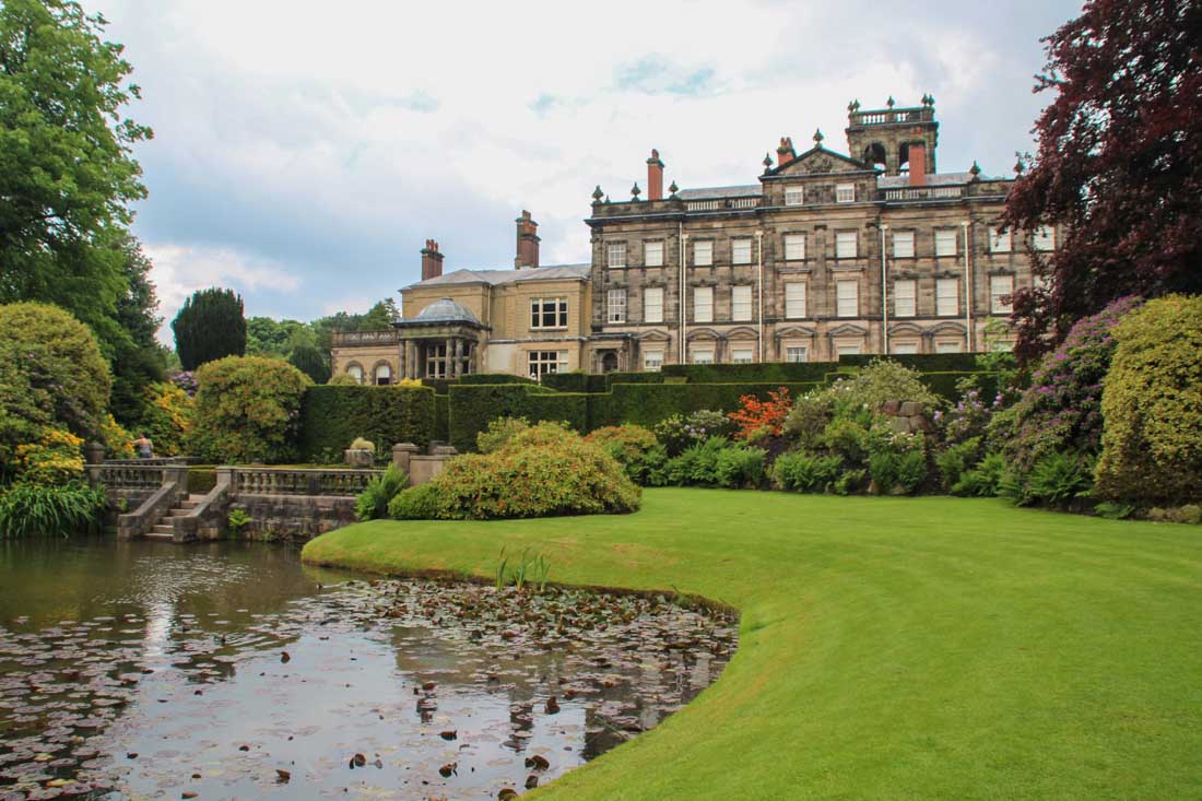 biddulph grange building with a pond in front of it