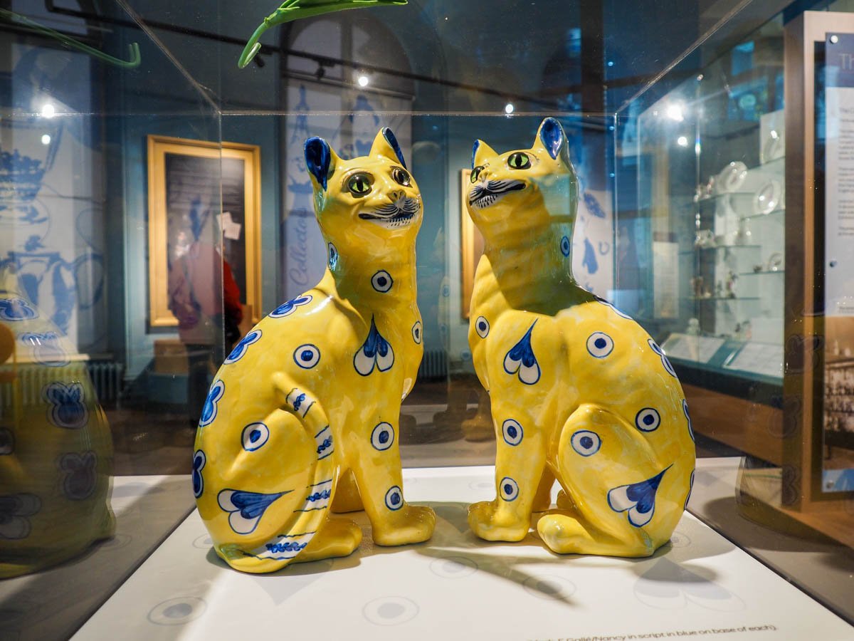 cats on display in museum
