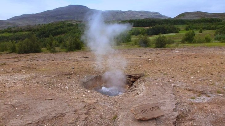 Iceland - Waterfalls, Water Spouts and Views from a Rift