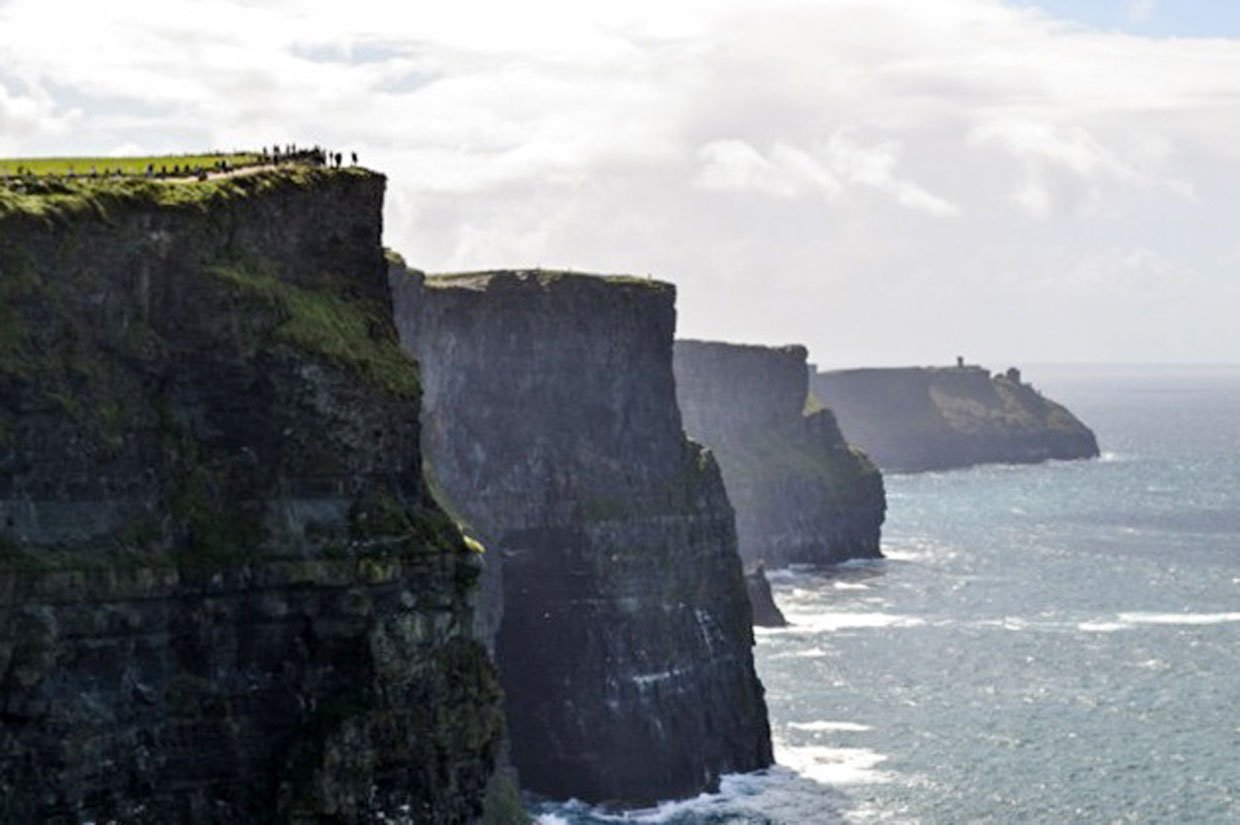 walkers on the cliffs top