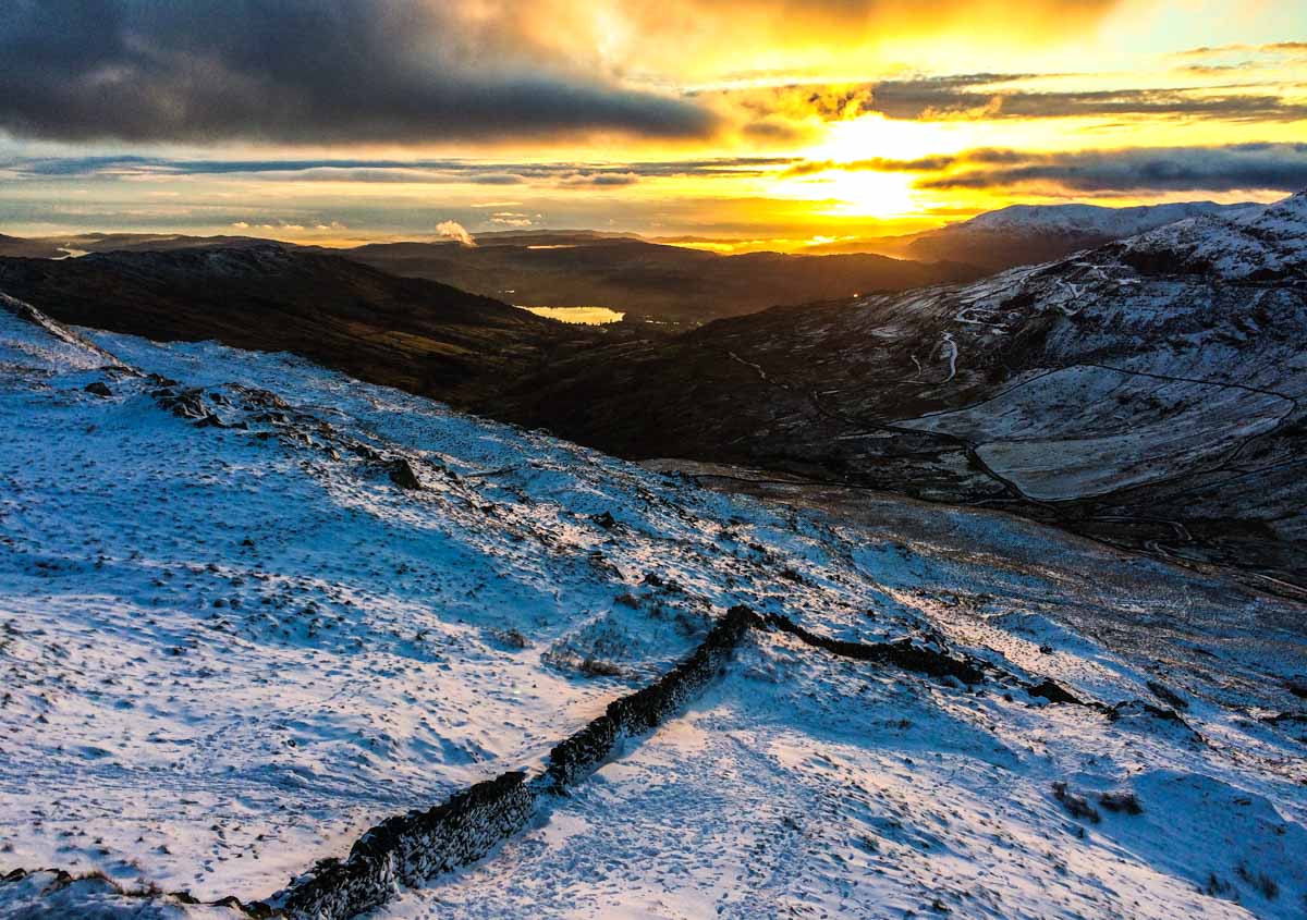 sunset and snow lake district